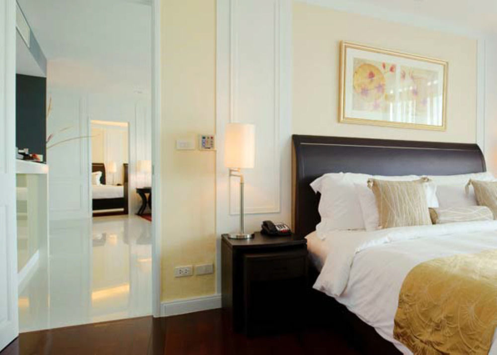 Dusit Suites Hotel Ratchadamri, Bangkok Eksteriør billede A bedroom at the hotel