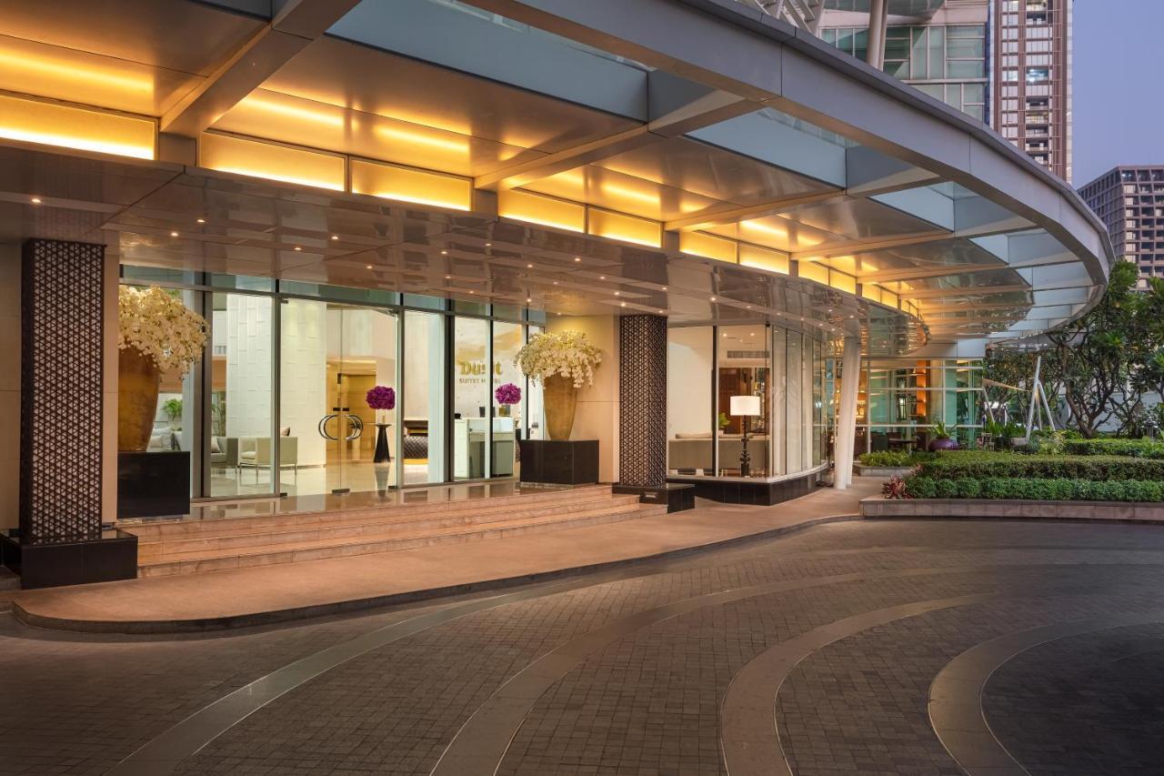 Dusit Suites Hotel Ratchadamri, Bangkok Eksteriør billede The entrance of the hotel